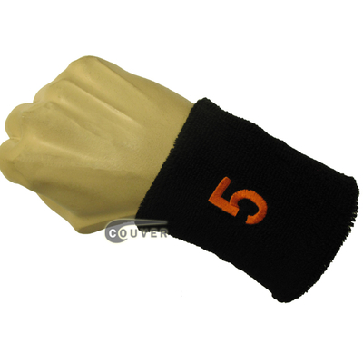 Black numbered sweat band number 5 five embroidered in orange