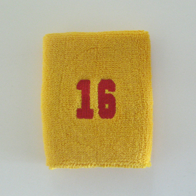 Number 16 sixteen golden mango yellow sweat wristband