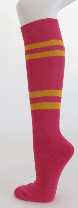 Hot pink knee high softball socks with golden yellow stripes