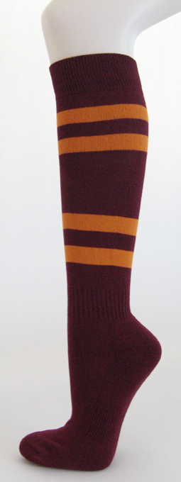 Maroon knee high softball socks with orange stripes